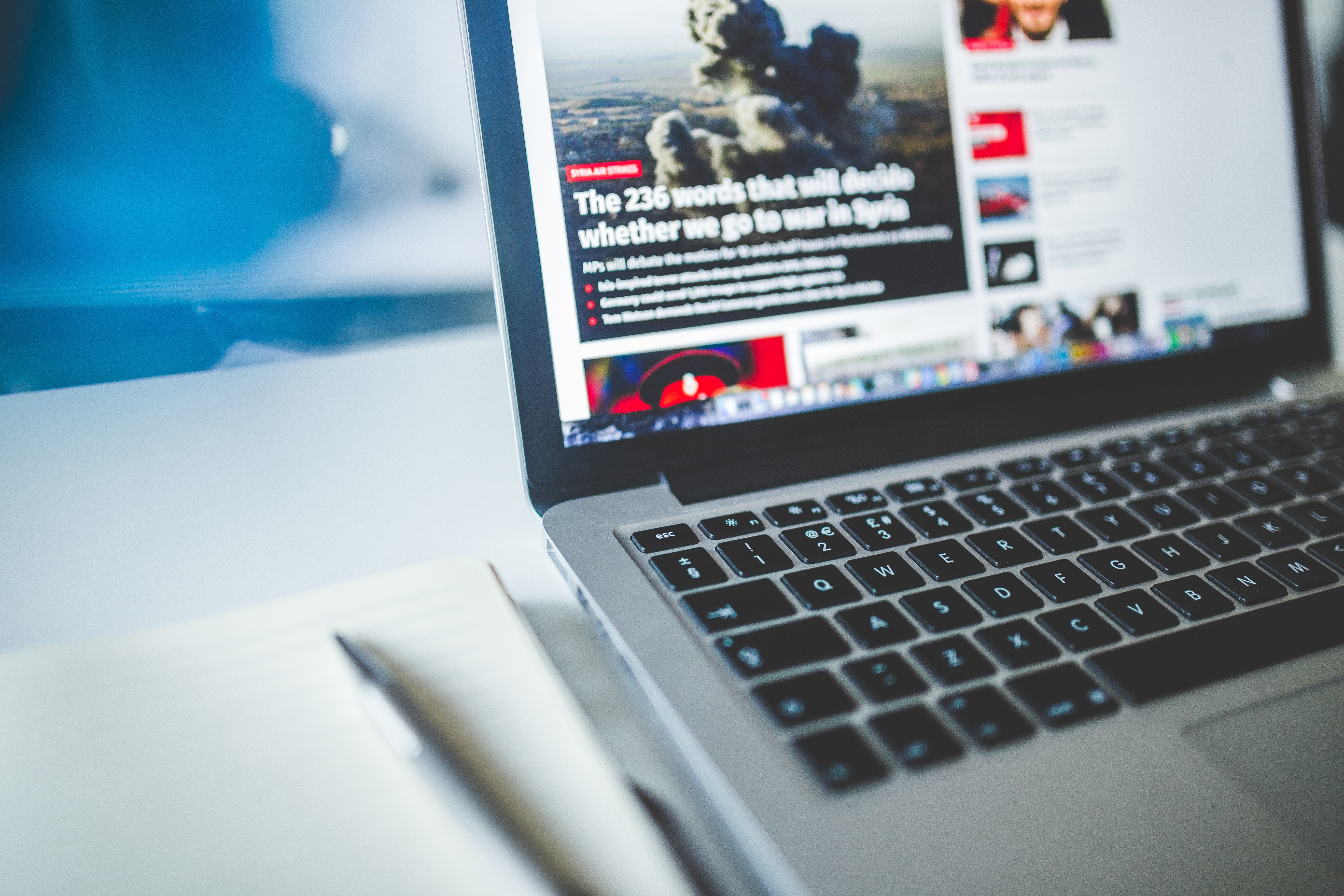 picture of a laptop and notebook